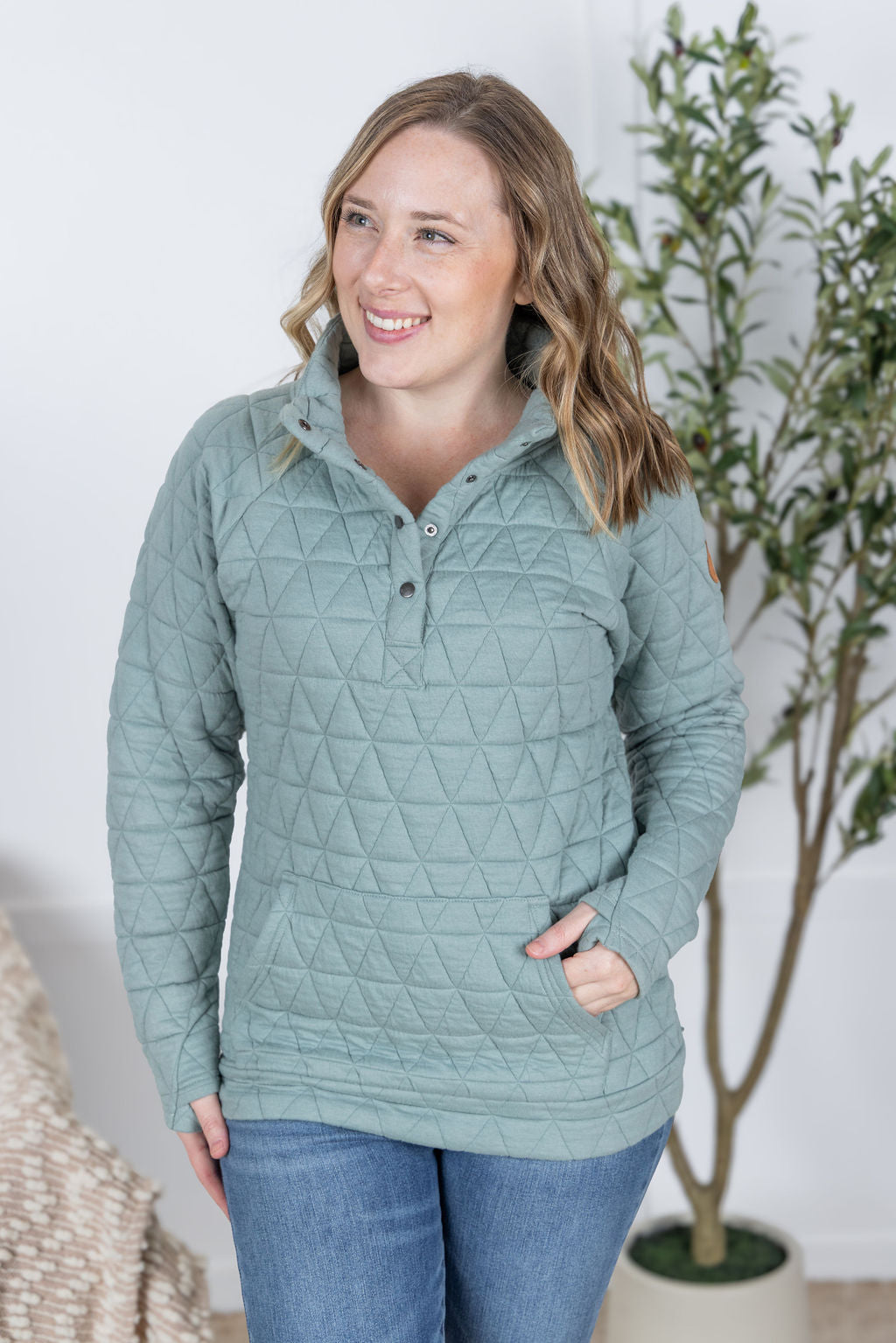 The Geometric Button Snap Pullover in Sage