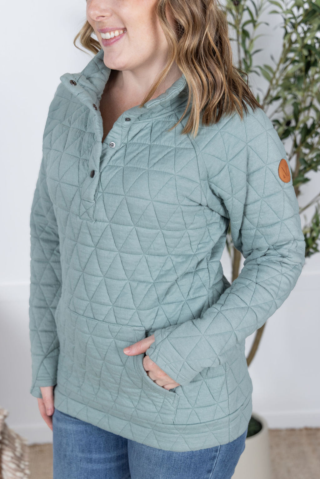 The Geometric Button Snap Pullover in Sage