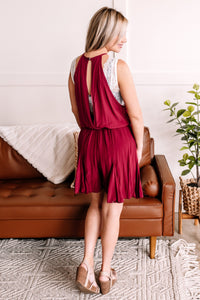In Store The Short Of It Pleated Romper In Wine