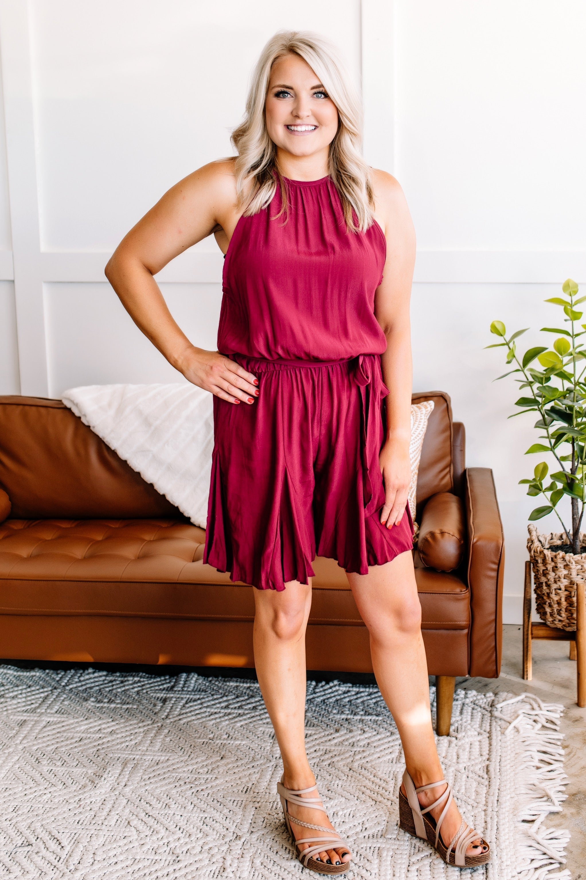 In Store The Short Of It Pleated Romper In Wine